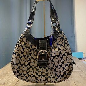 Coach Black and Tan Patterned Hobo Bag.